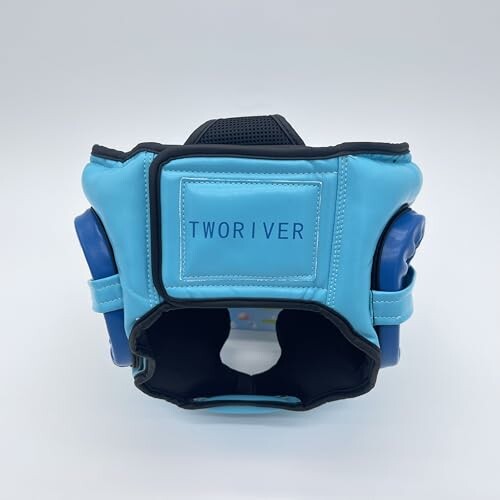 Blue boxing headgear with 'TWORIVER' label.