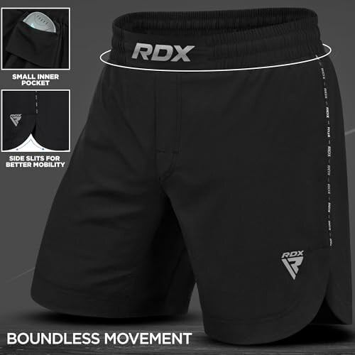 Black RDX training shorts with inner pocket and side slits for mobility.