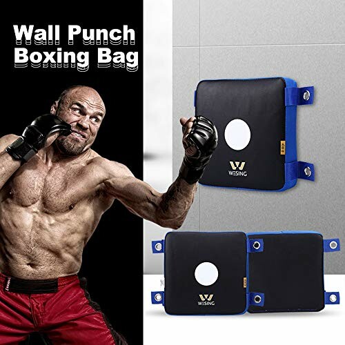 Man punching a wall-mounted boxing bag.